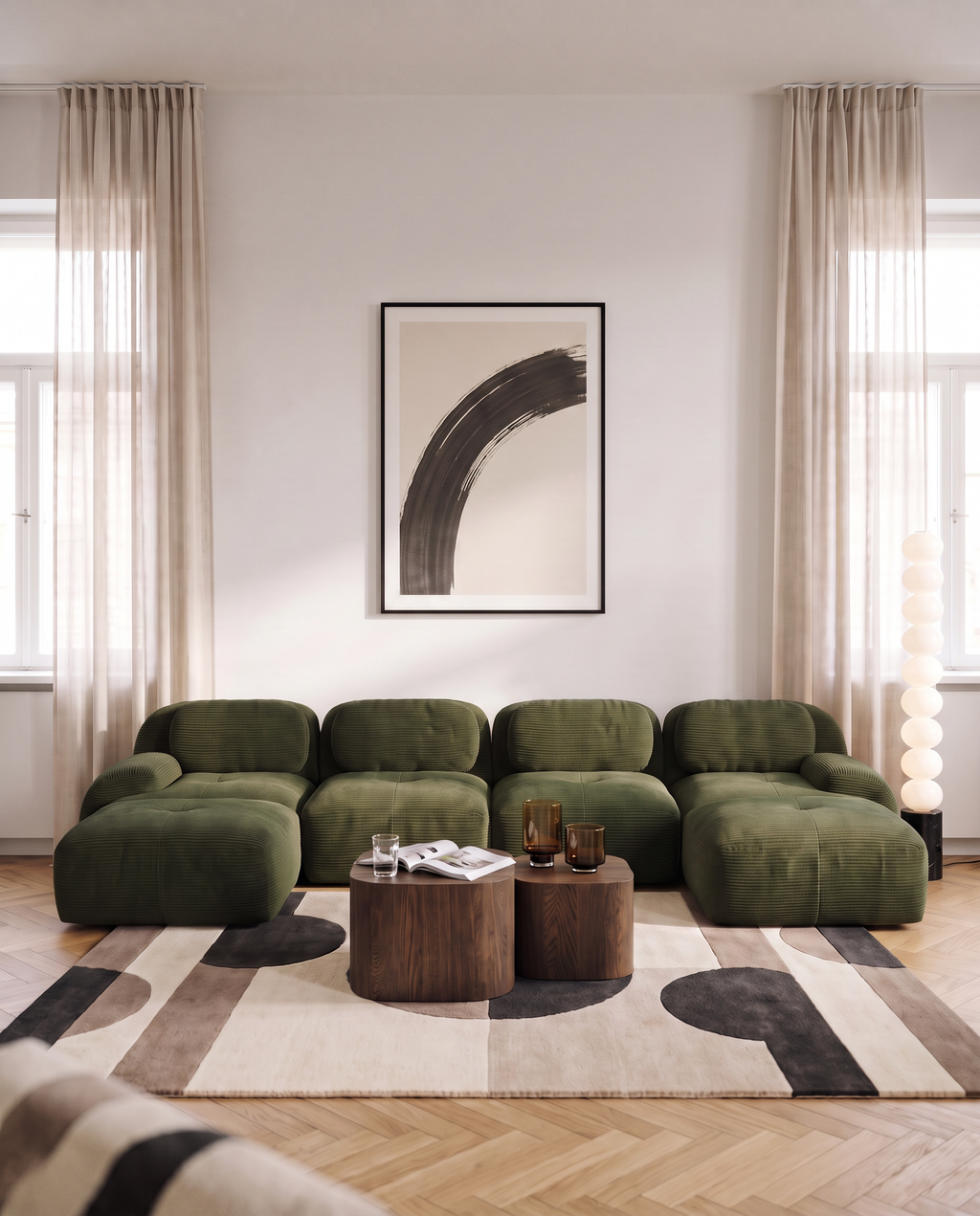 Canapé compressé en U Archipel en velours côtelé vert dans un salon lumineux avec tapis graphique